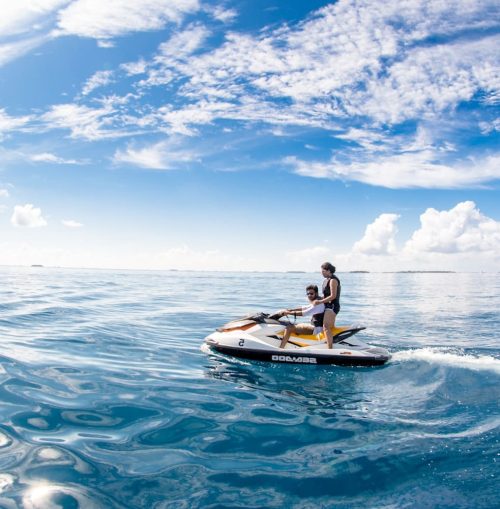 two people on a jetski in the ocean